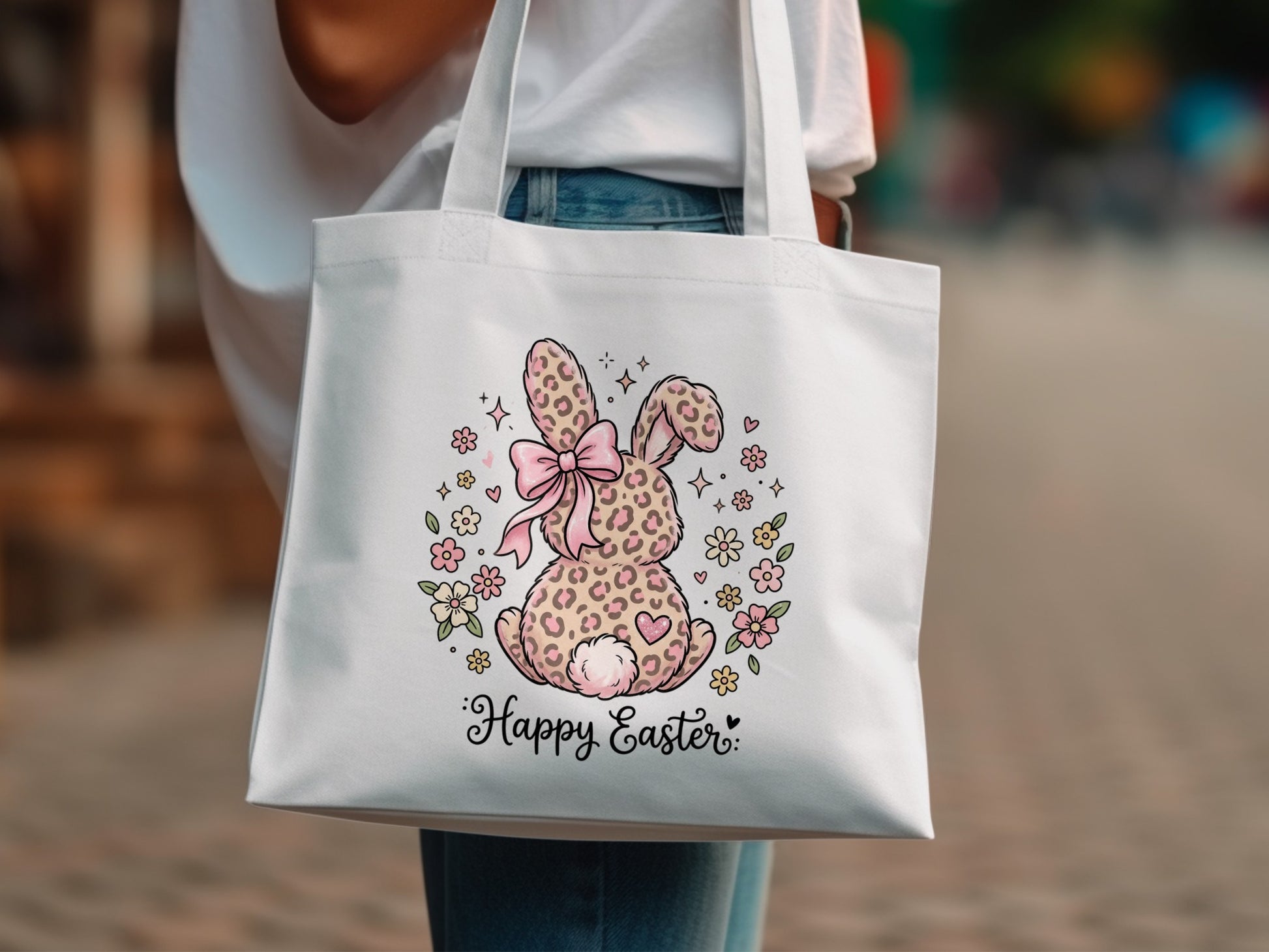 White tote bag with a pink leopard print bunny and "Happy Easter" text.