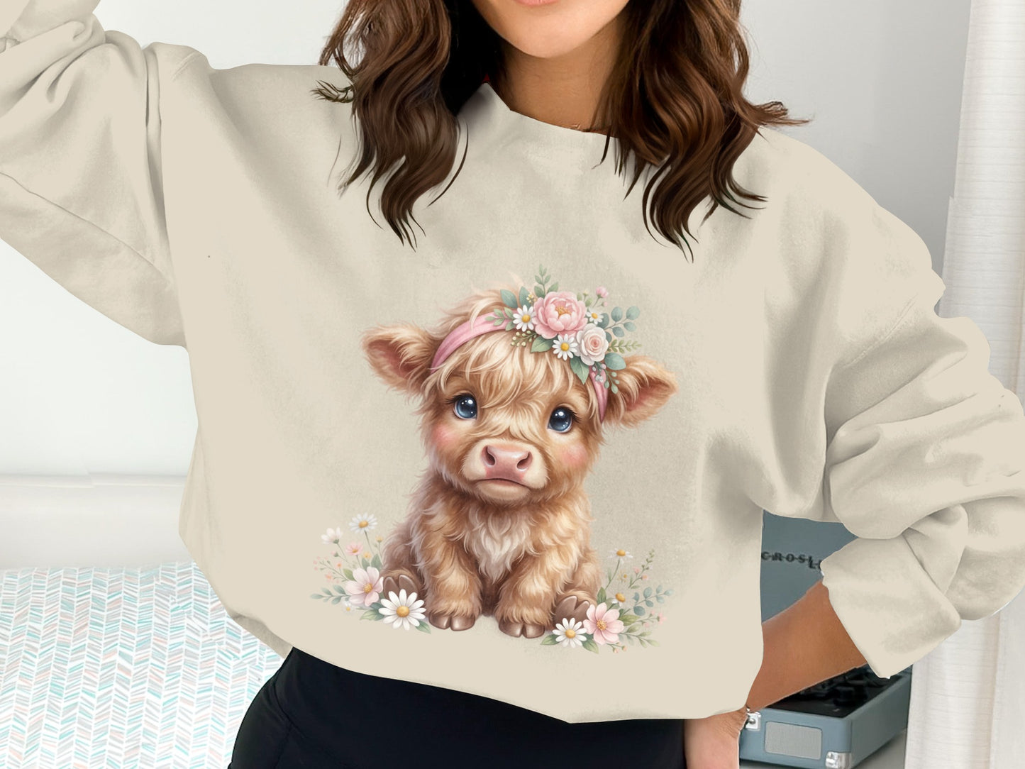 Cute calf with floral headband on light brown sweatshirt.