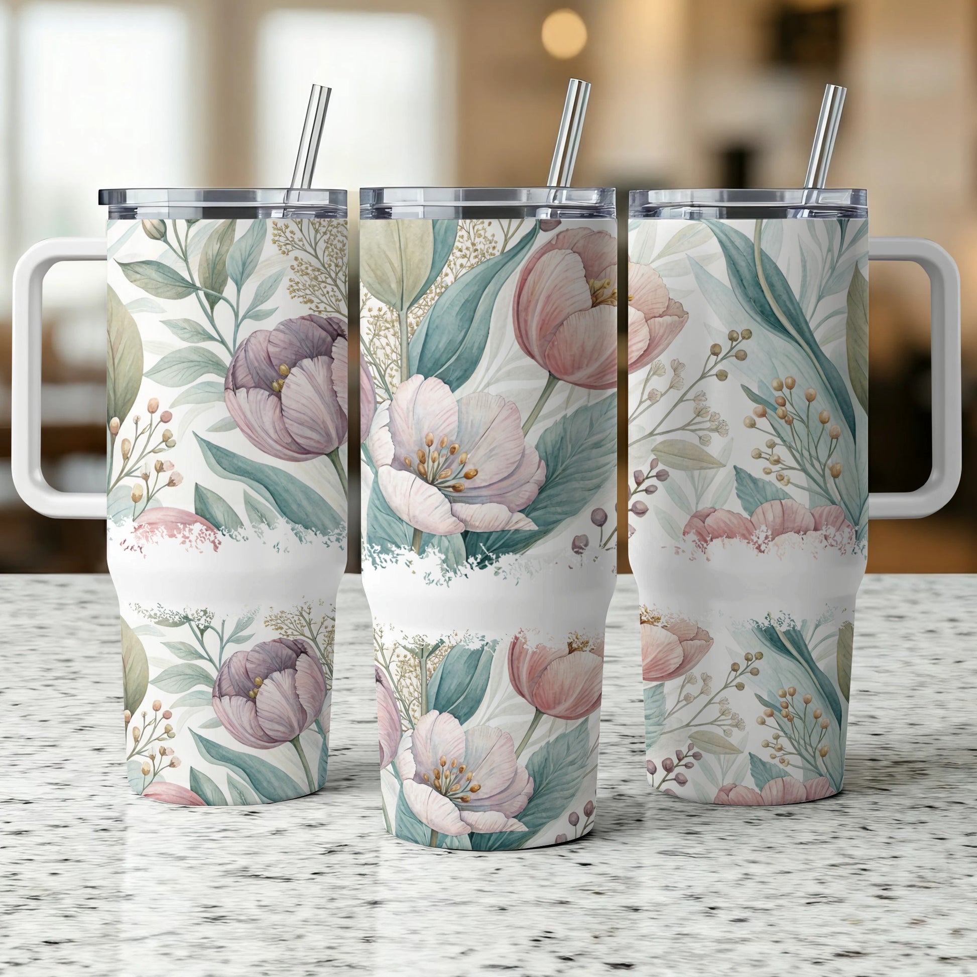 Three tumblers with a floral pattern of pink and purple tulips and green leaves.