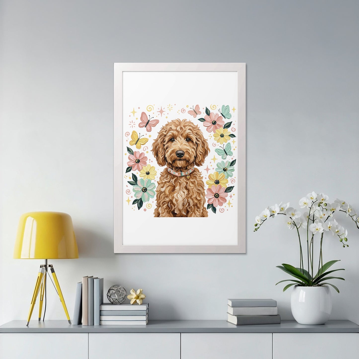 Framed print of a fluffy goldendoodle surrounded by colorful butterflies and flowers.