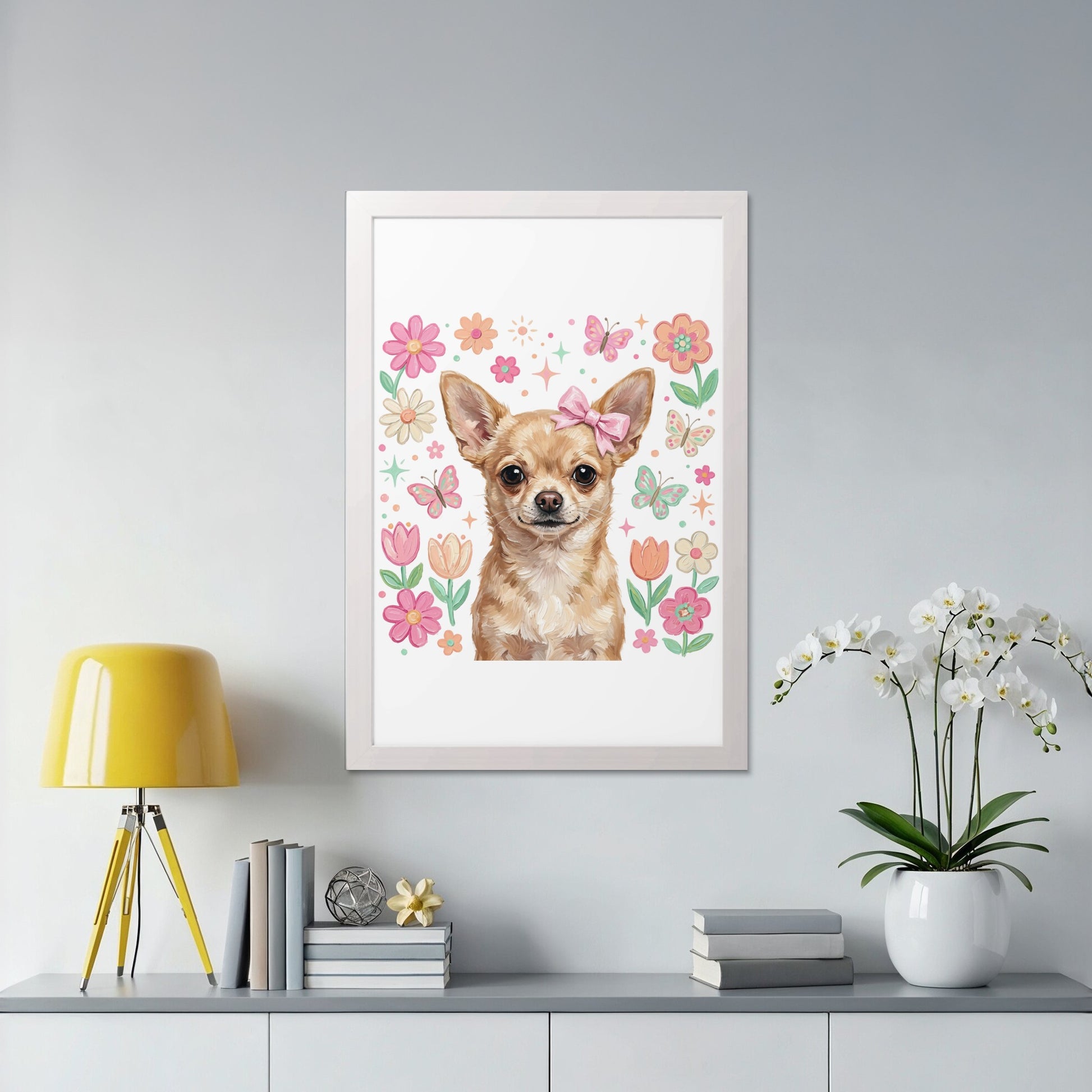 Chihuahua with pink bow and floral border in a white frame.