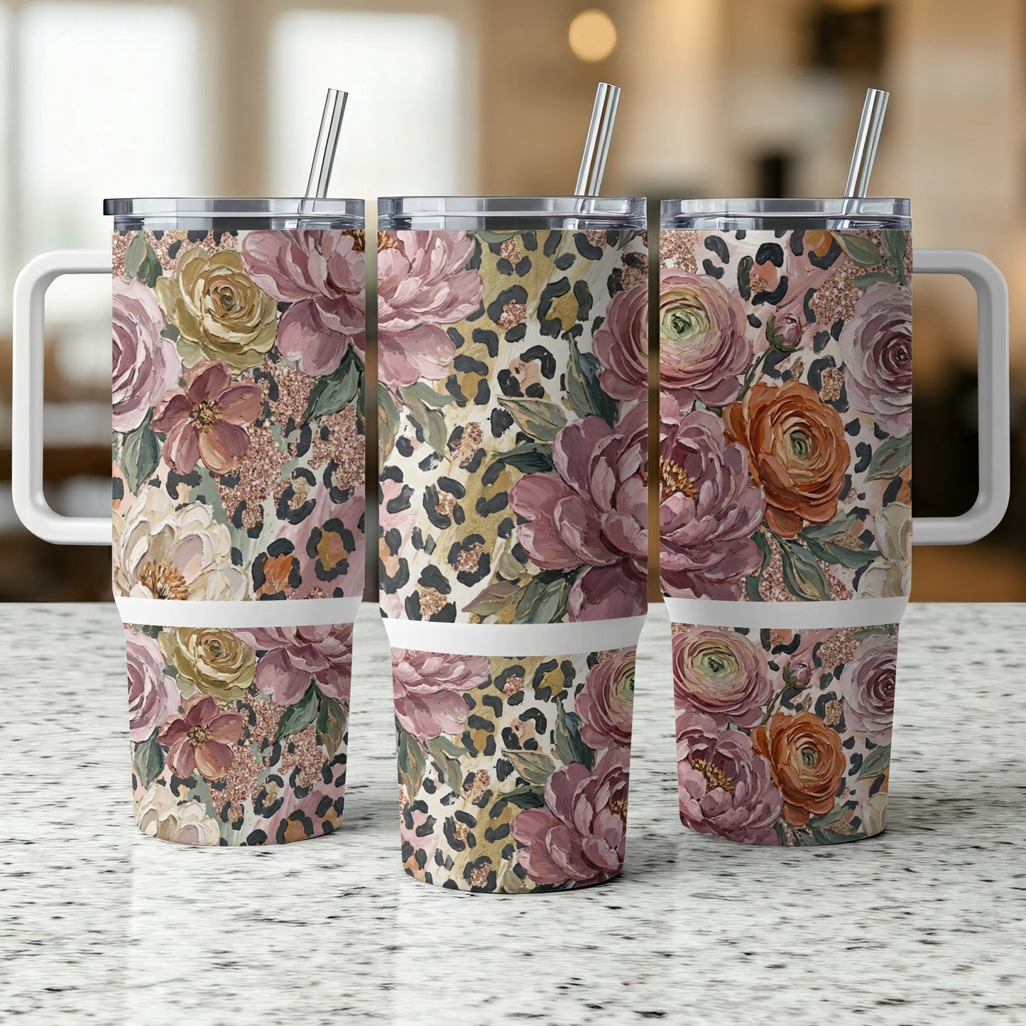 Three tumblers with floral and leopard print patterns.