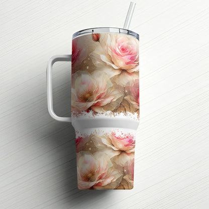 Large insulated tumbler with pink roses and a straw.