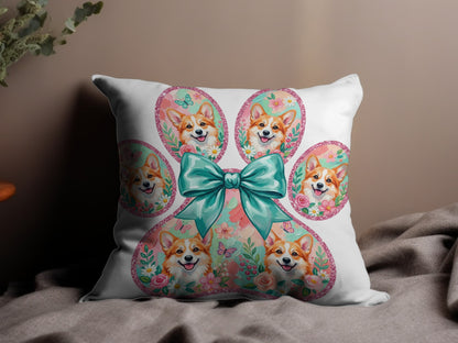 Corgi paw print design with bow, flowers, and butterflies on a white pillow.