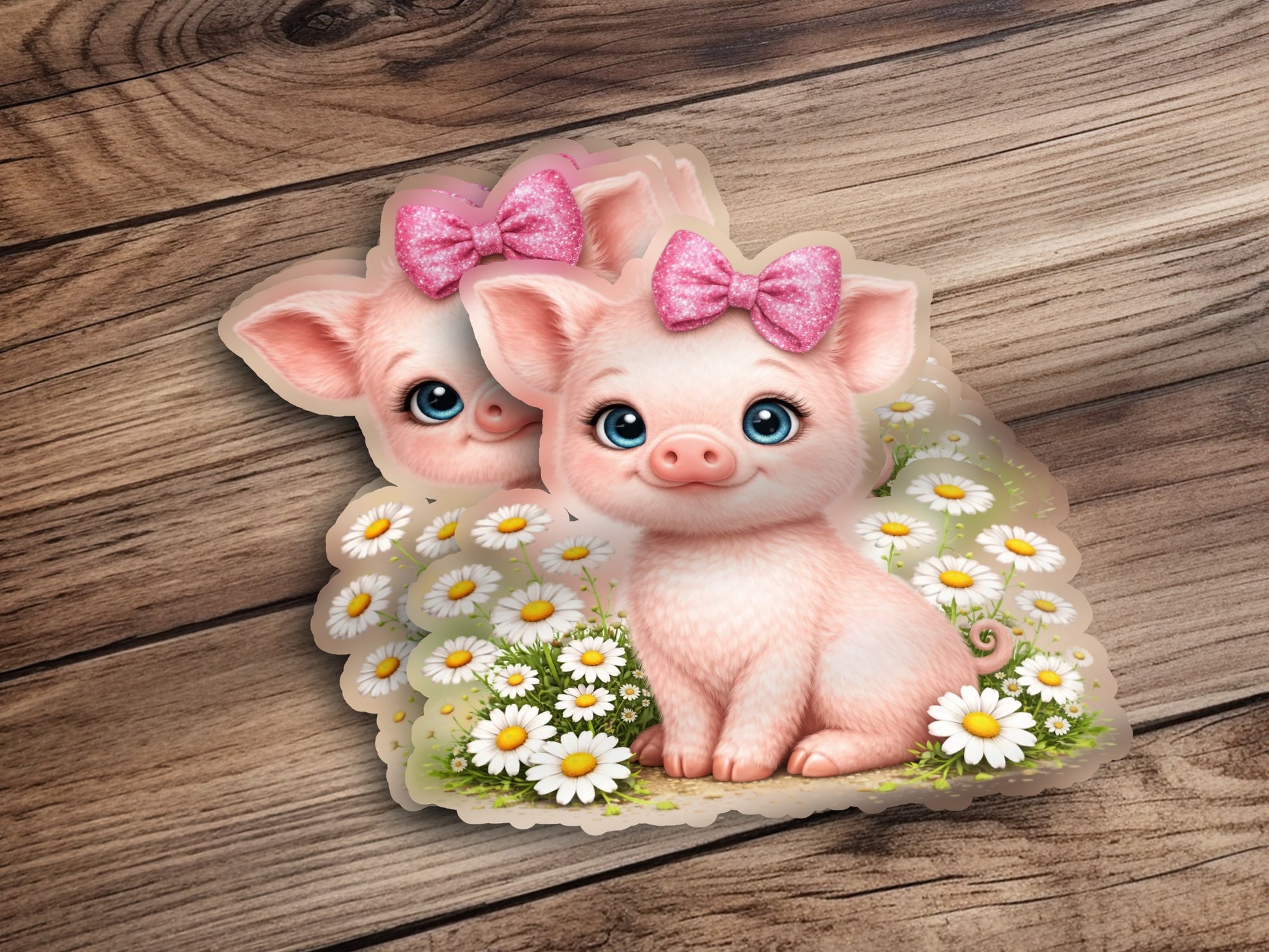 Two cartoon pigs with pink bows sit in a field of daisies.