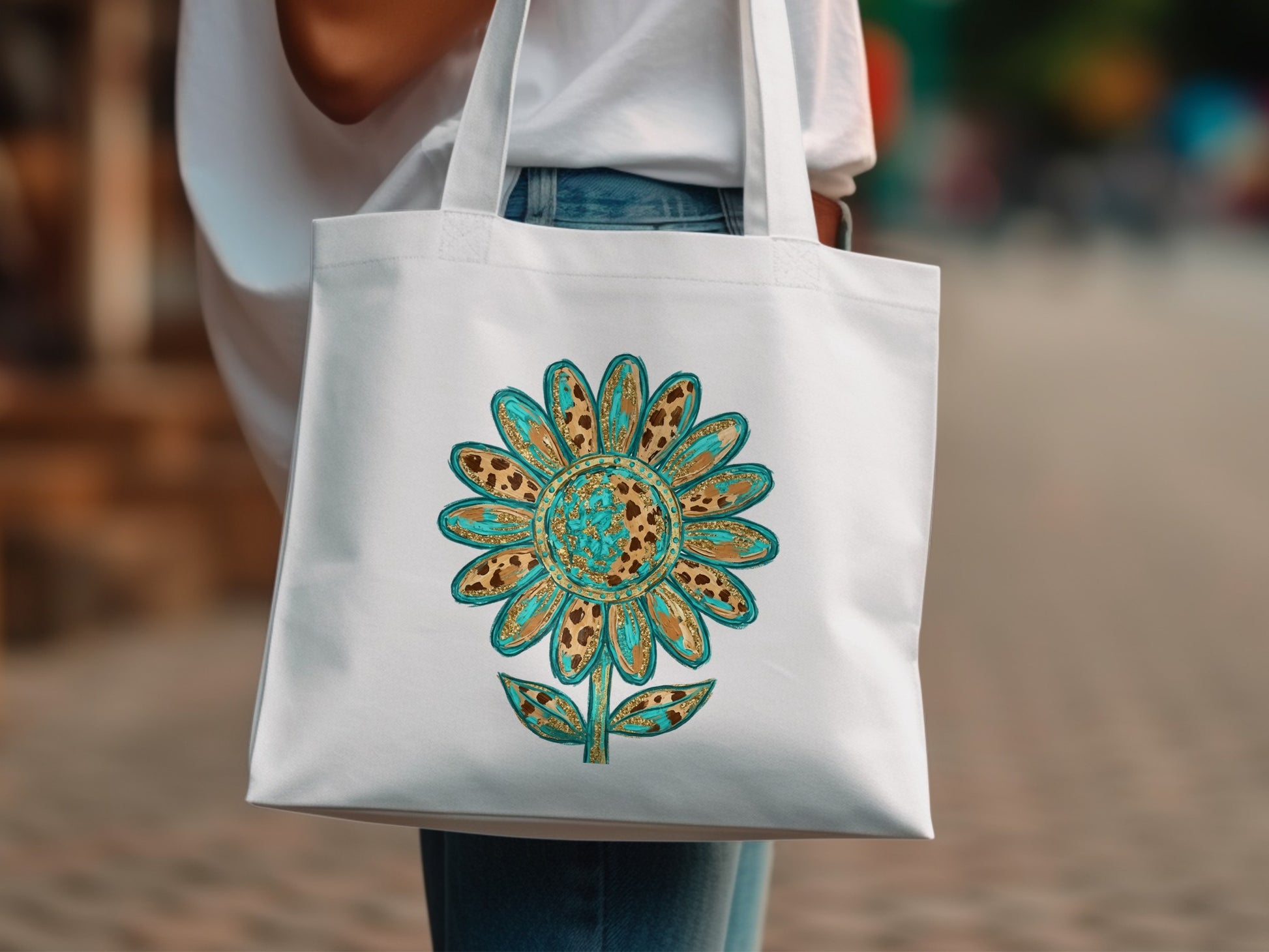 White tote bag with turquoise and gold leopard print sunflower design.