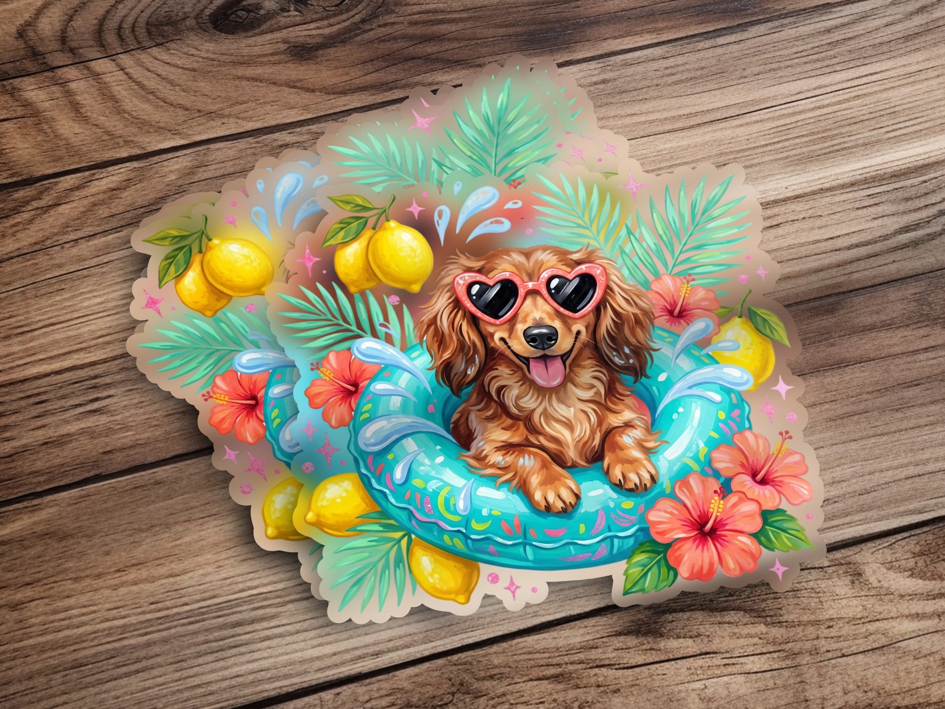 Dachshund in a float with sunglasses, lemons, and tropical flowers.