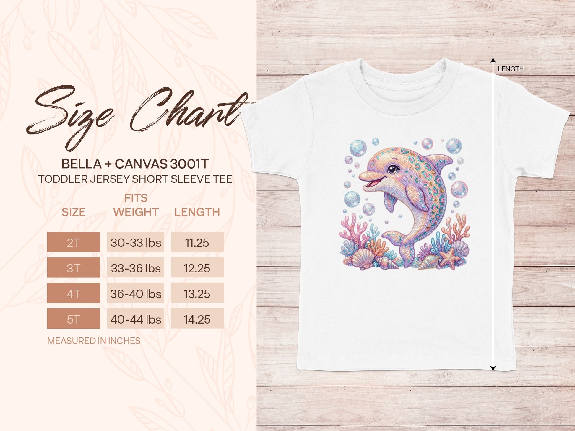 Toddler tee size chart with cartoon dolphin illustration.