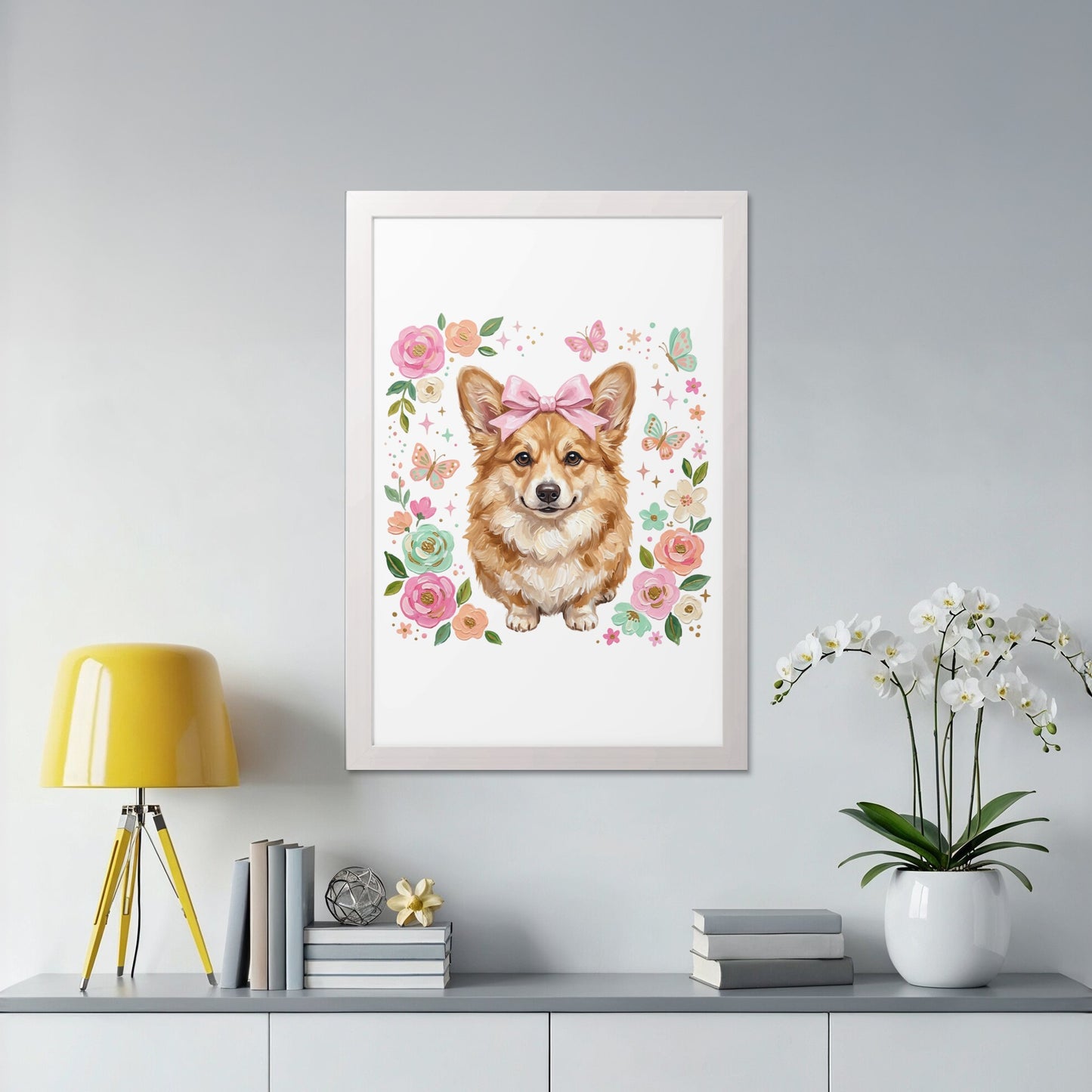Framed illustration of a corgi wearing a pink bow, surrounded by flowers and butterflies.