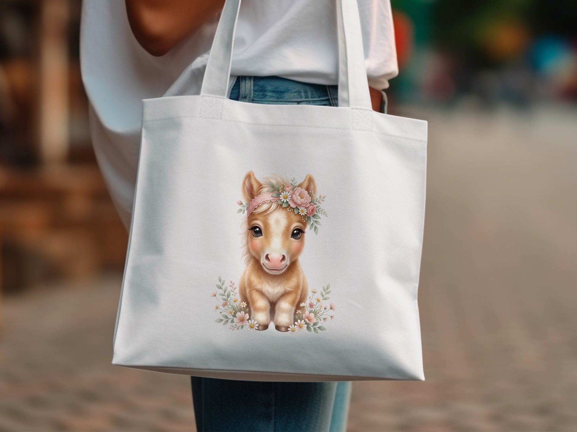 White tote bag with a cute baby horse wearing a flower crown.