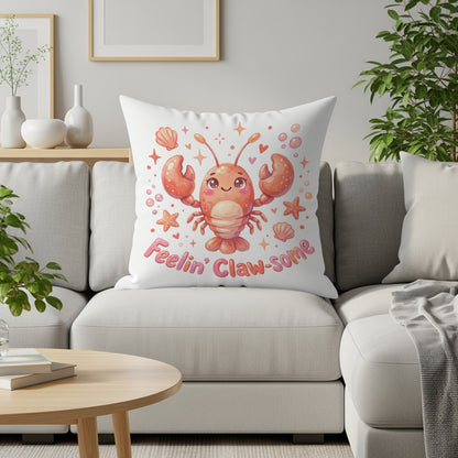 Lobster pillow with "Feelin' Claw-some" text on a couch.