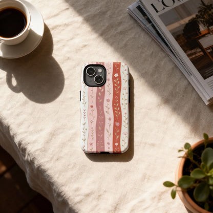 Pink and white striped phone case with floral pattern.