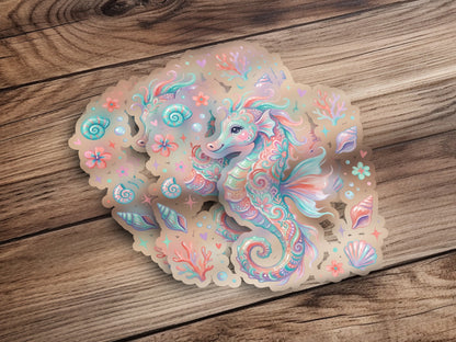 Whimsical seahorse sticker with pastel floral and shell accents.