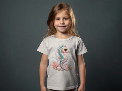 Girl wearing a gray t-shirt with a colorful seahorse graphic.