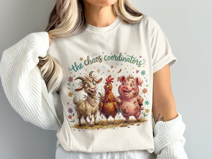 T-shirt with cartoon goat, pig, and chicken saying "The Chaos Coordinators".