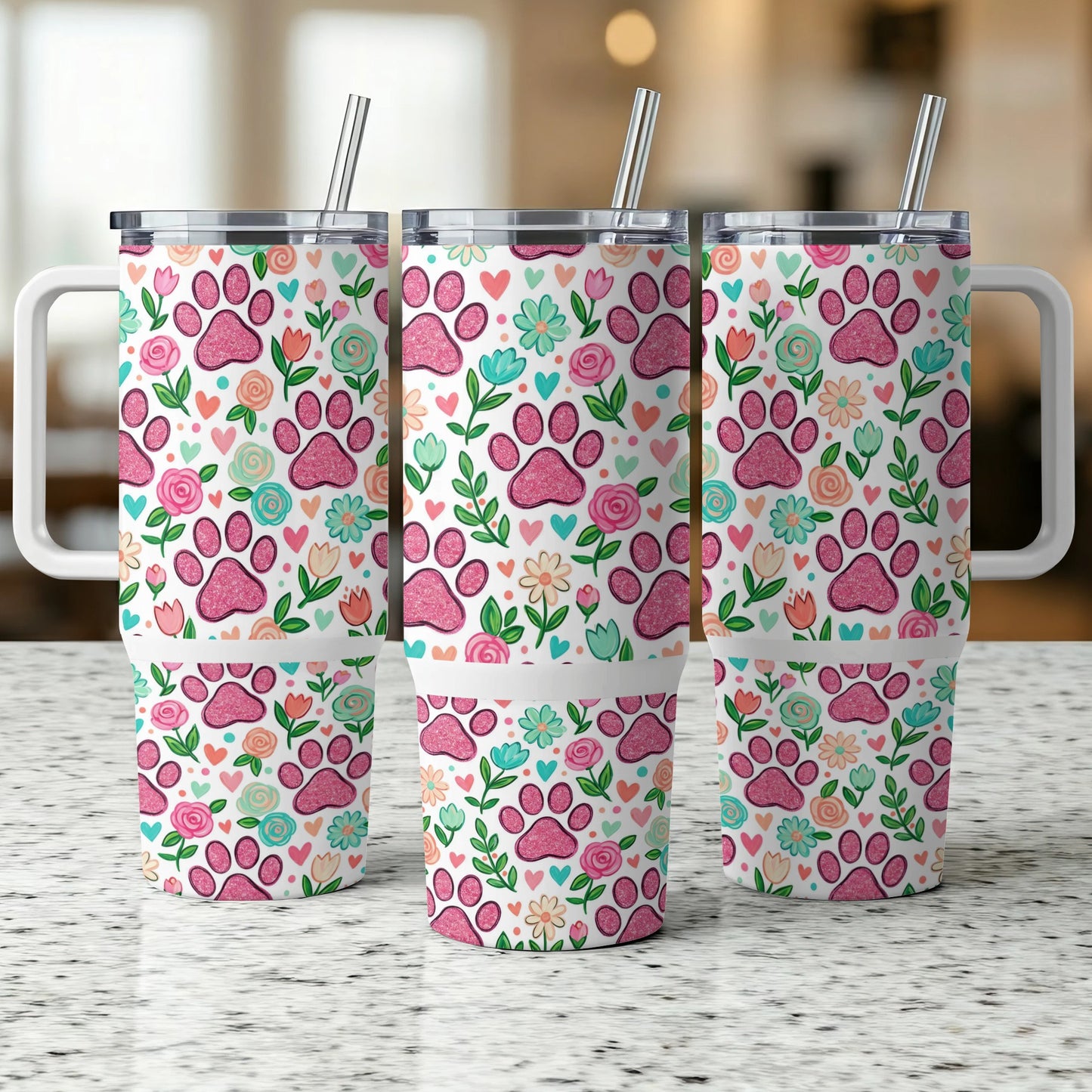 Three tumblers with pink paw prints, flowers, and hearts pattern.