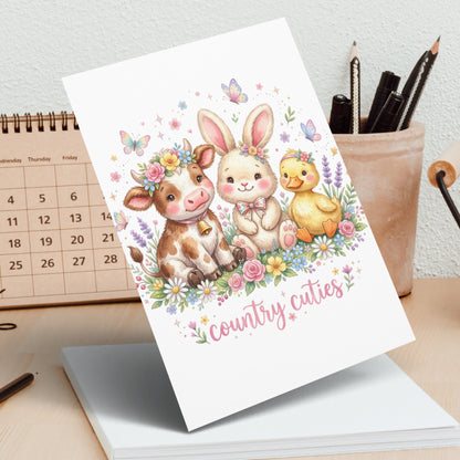 Greeting card featuring a cow, bunny, and duck with "country cuties" text.