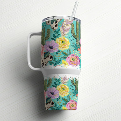 Floral and cactus pattern tumbler with a handle and straw.