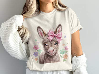 Cream t-shirt with watercolor donkey graphic and pastel flowers.