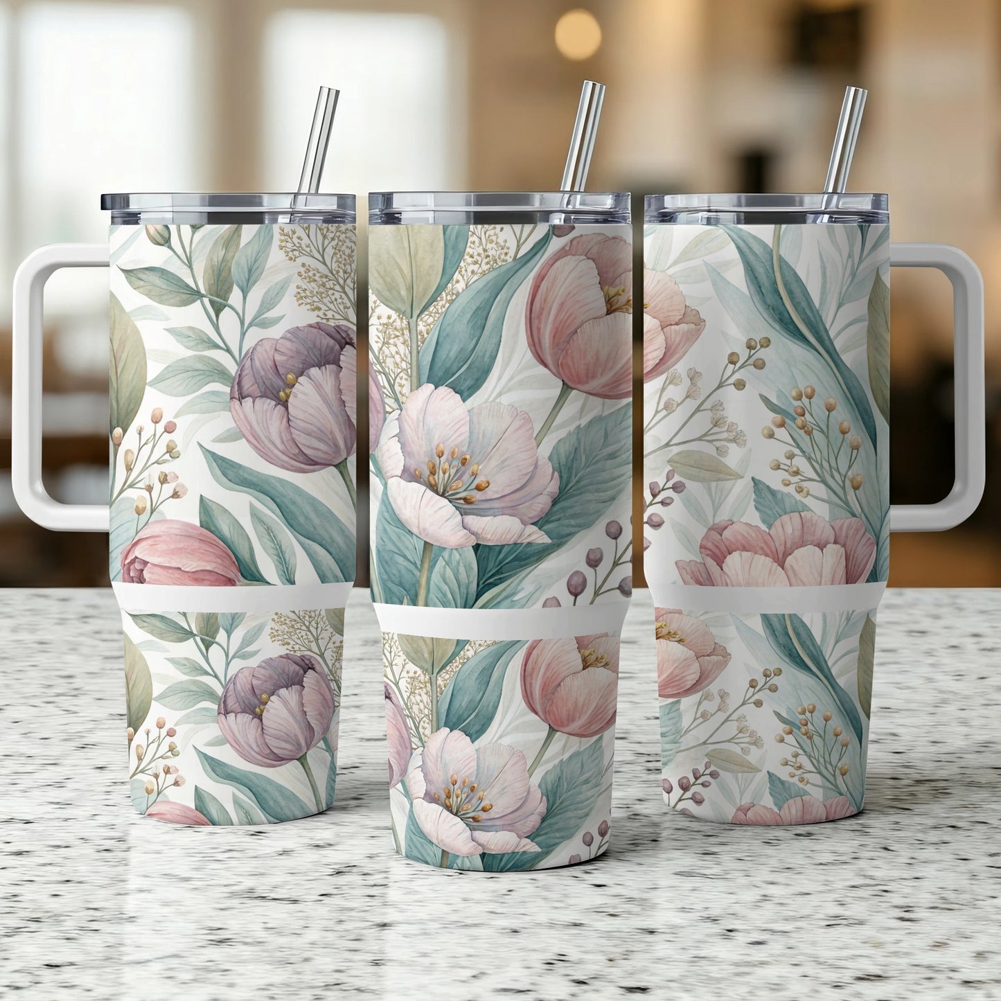 Three tumblers with a floral pattern featuring tulips and greenery.