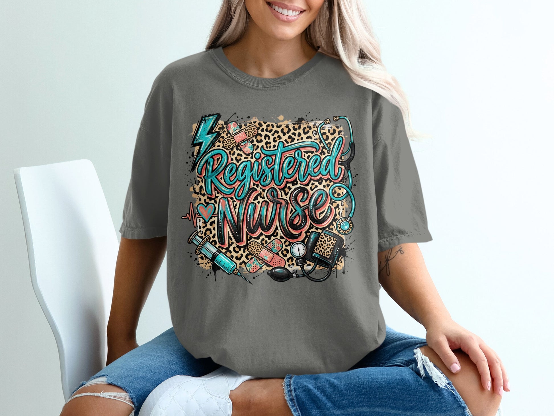 Registered Nurse graphic tee with stethoscope, syringe, and leopard print.