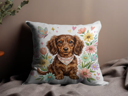Brown dachshund wearing a bandana, surrounded by watercolor flowers and butterflies.