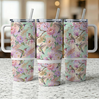 Three tumblers with a floral and hummingbird design.