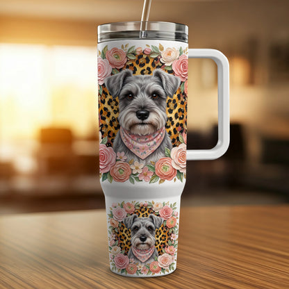 Schnauzer dog with floral and leopard print bandana on tumbler.