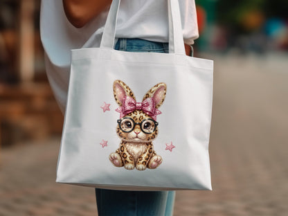 White tote bag with sequined bunny wearing glasses and pink bow.