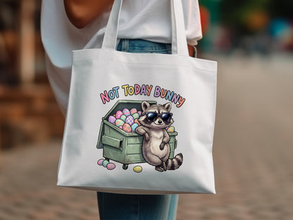 Raccoon with sunglasses sits in a dumpster full of Easter eggs with text "NOT TODAY BUNNY".