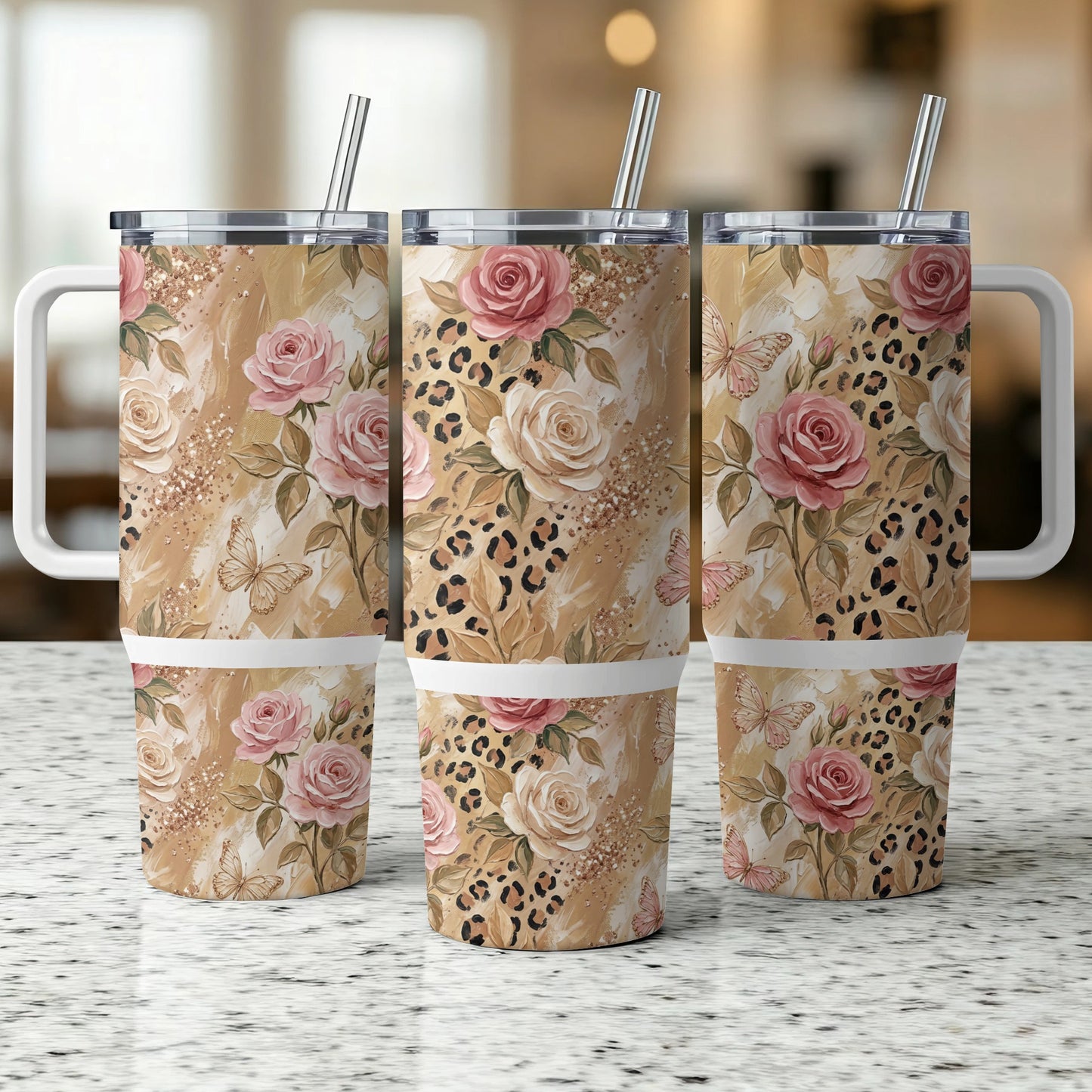 Three tumblers with rose, leopard, and butterfly pattern.