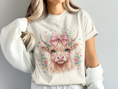 Watercolor Highland cow with pink bow and flowers on a white t-shirt.