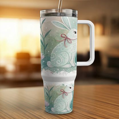 White Easter bunny tumbler with pink bow and floral accents.
