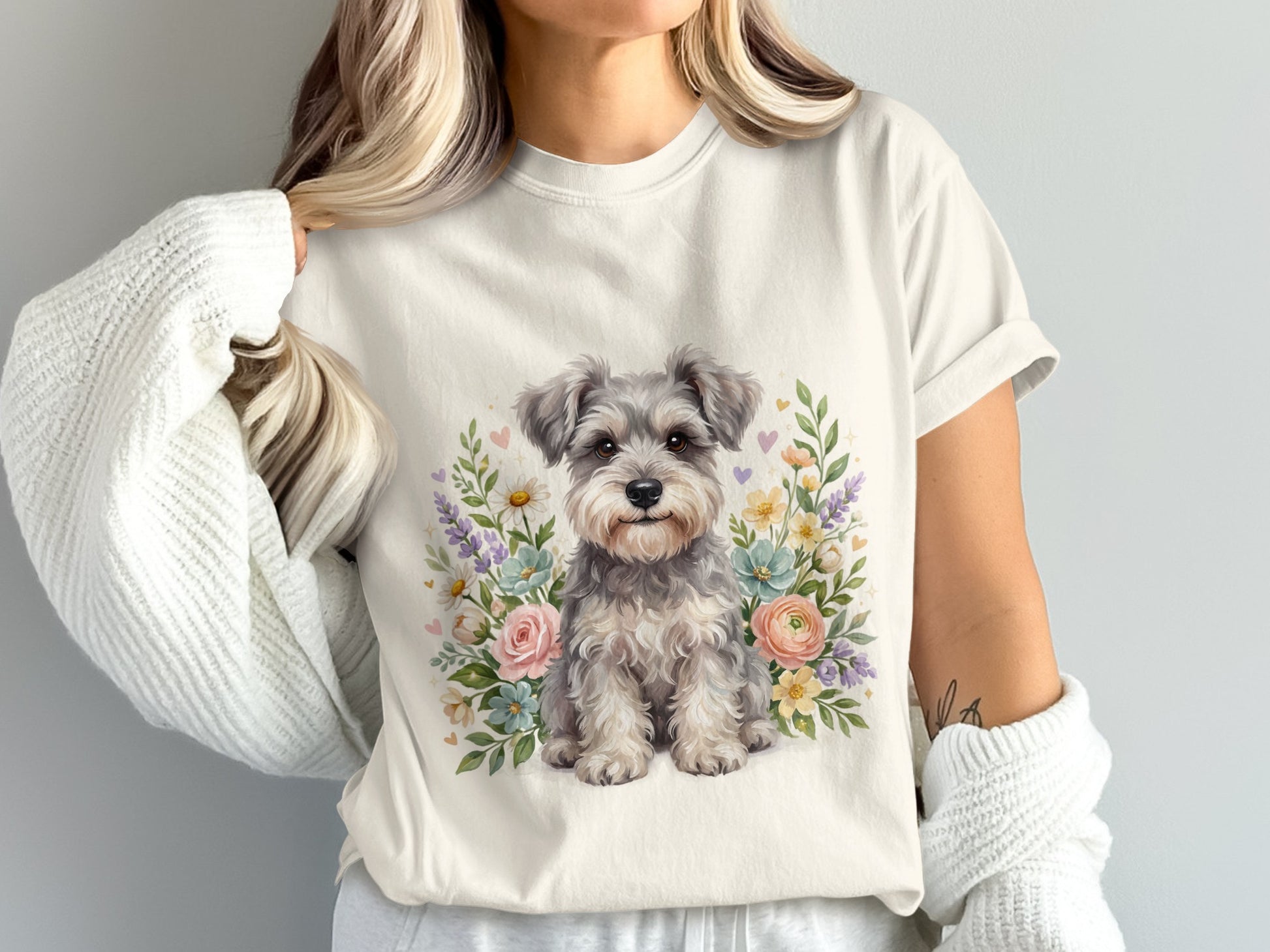 White t-shirt with watercolor schnauzer and floral illustration.