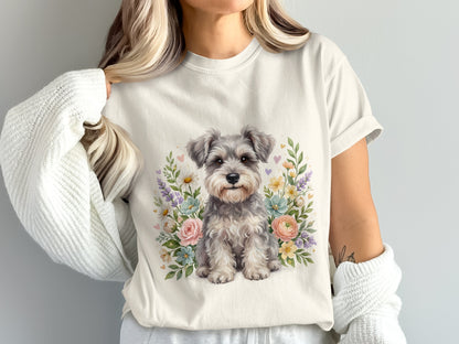 White t-shirt with watercolor schnauzer and floral illustration.