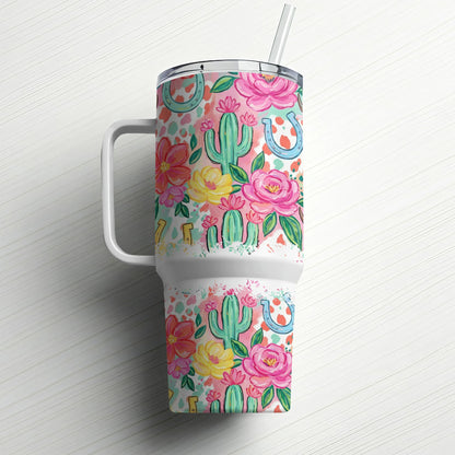 Floral and cactus pattern tumbler with handle and straw.