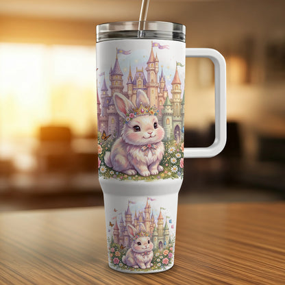 White tumbler with a crowned rabbit and a castle design.