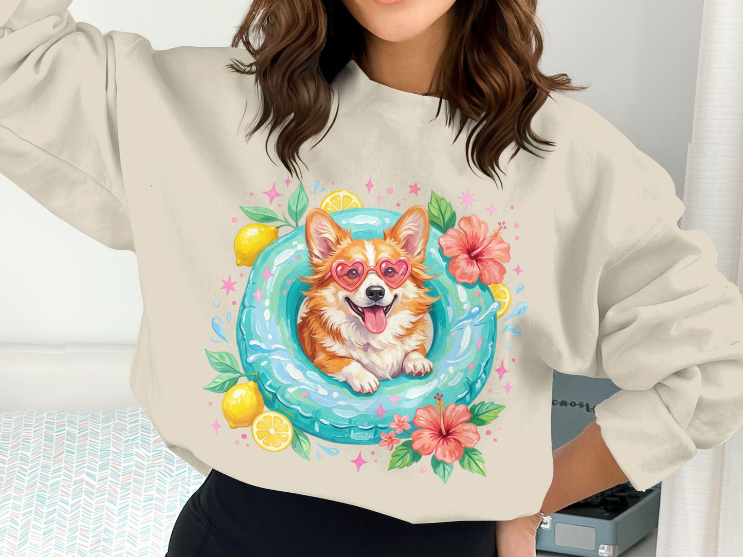 Corgi wearing heart sunglasses in pool float with lemons and hibiscus flowers.