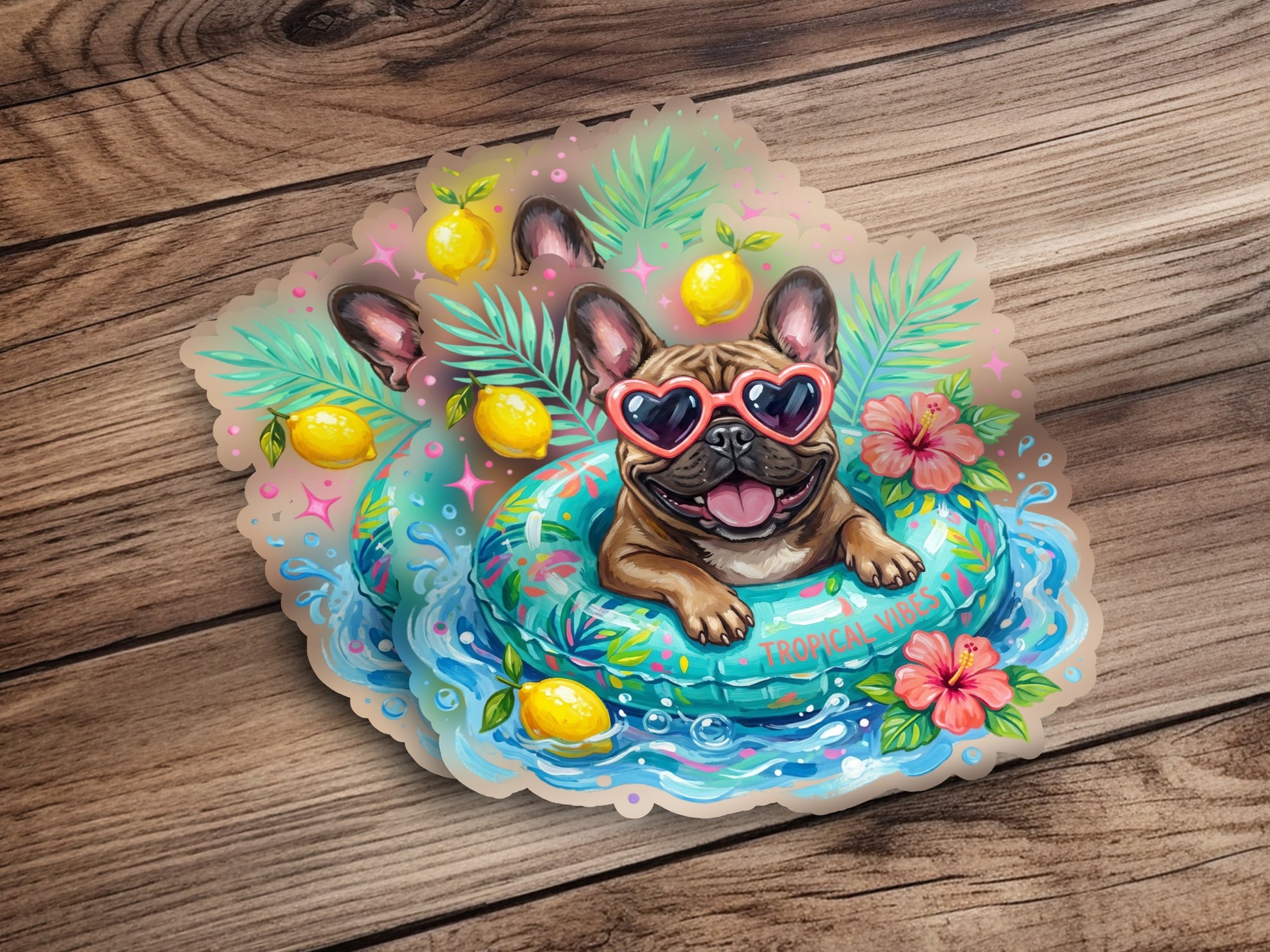 French bulldog in a float with heart sunglasses, lemons, and tropical flowers.
