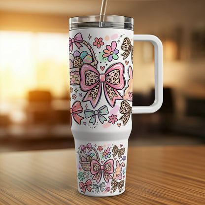 White tumbler with Easter-themed pattern of bows, baskets, and bunnies.
