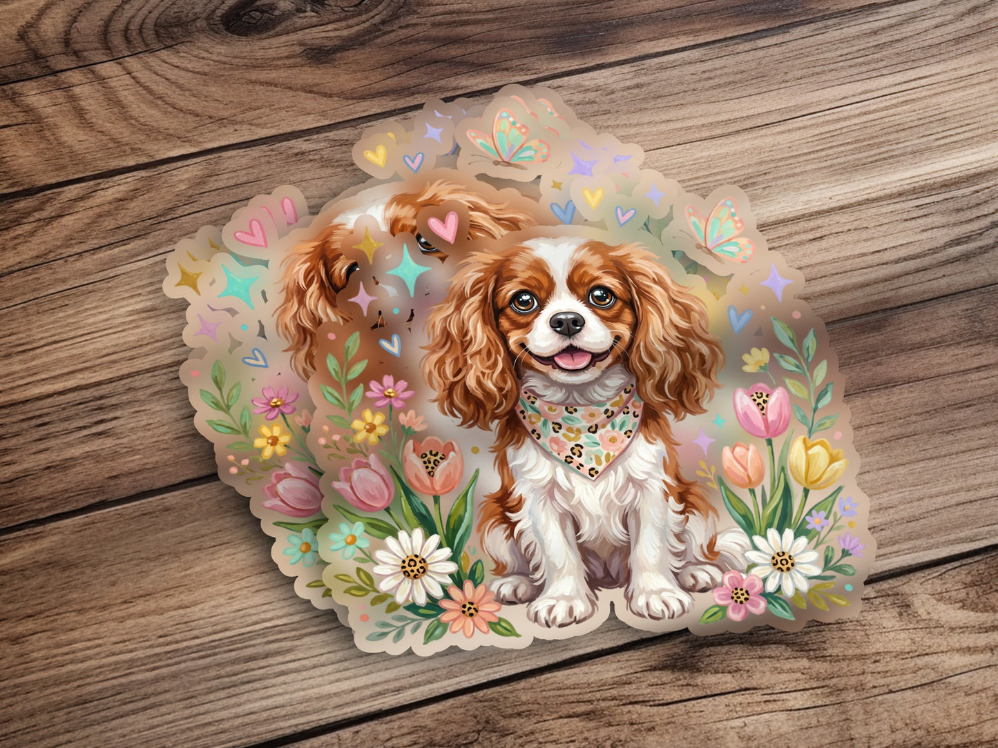 Cavalier King Charles Spaniel wearing a bandana surrounded by flowers and butterflies.
