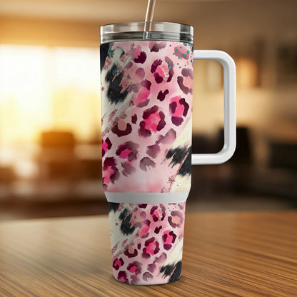 Tumbler with pink and black leopard print and glitter accents.