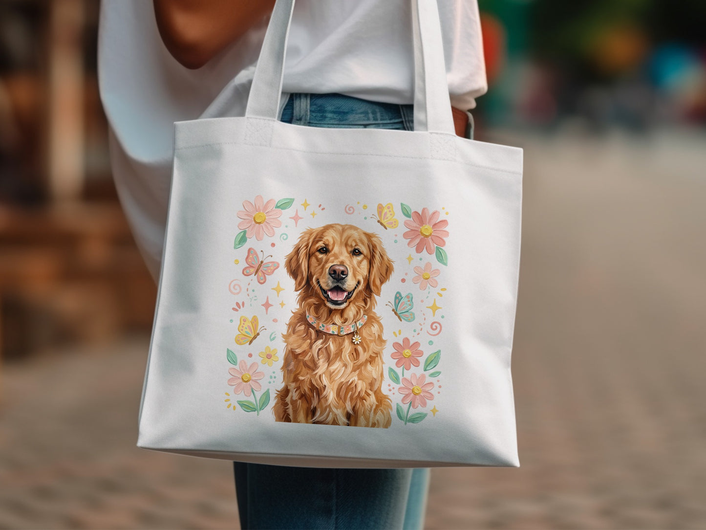 White tote bag with a watercolor Golden Retriever surrounded by flowers and butterflies.