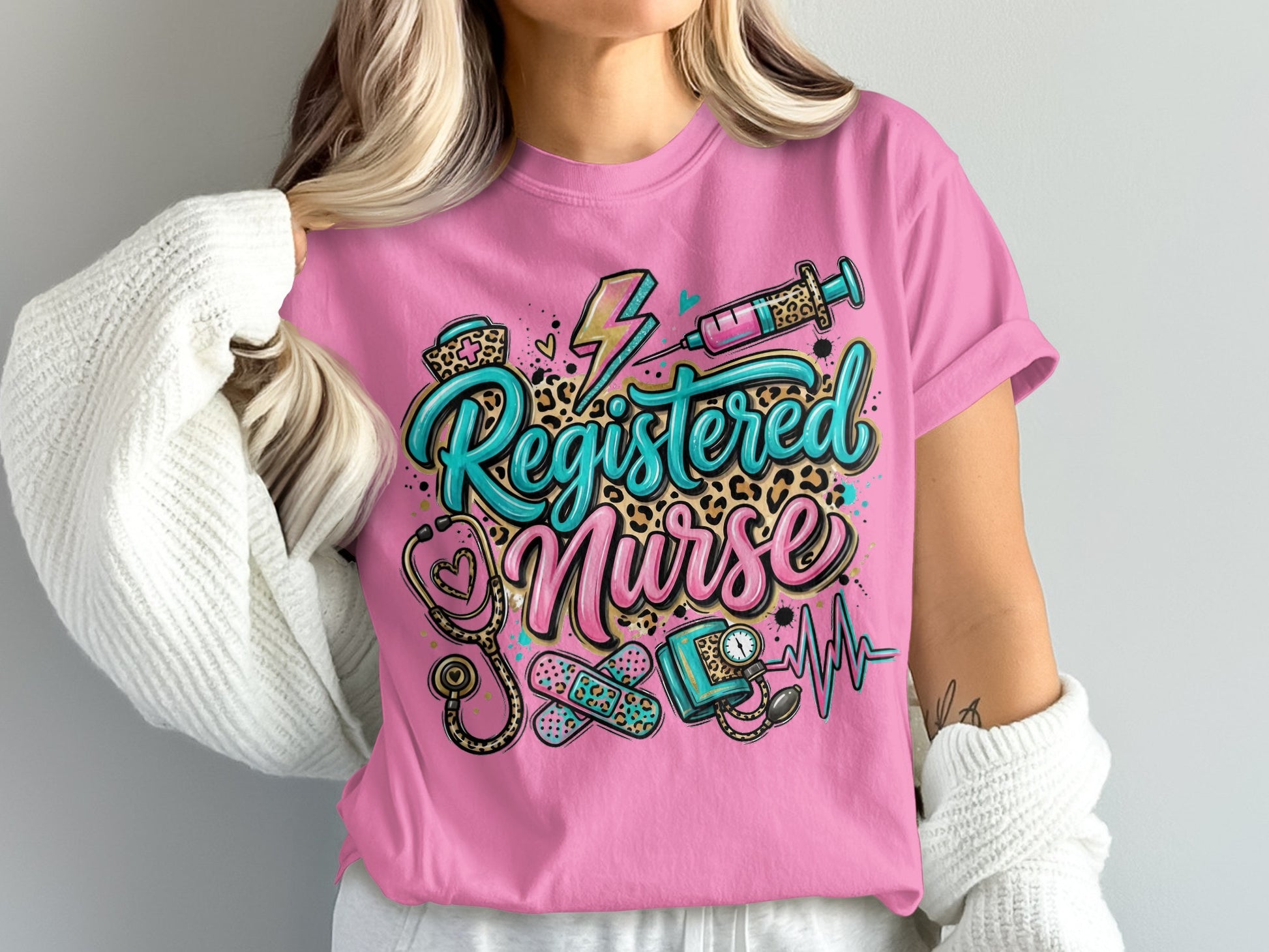 Pink t-shirt with "Registered Nurse" text and medical graphic elements.