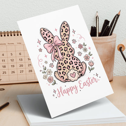 Leopard print Easter bunny with pink bow and "Happy Easter" text.