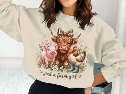 Crewneck sweatshirt featuring a pig, cow, and chicken with flowers and "just a farm girl" text.