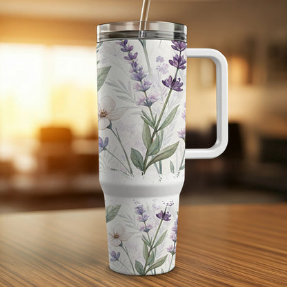 White tumbler with purple lavender and white floral pattern, lid and handle.