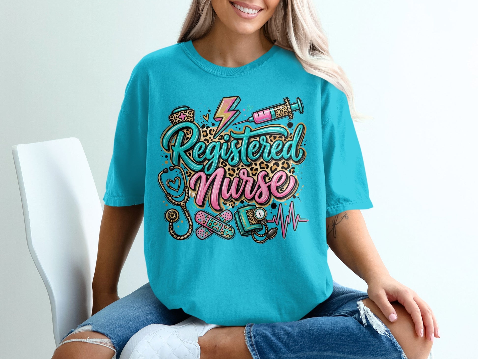 Turquoise t-shirt with "Registered Nurse" text and medical graphics.