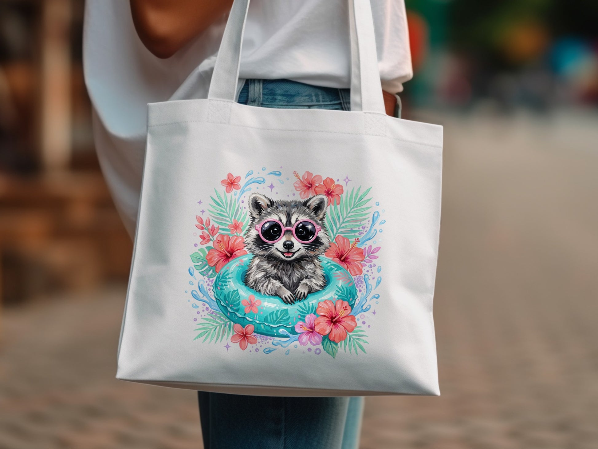 Tote bag with a raccoon wearing sunglasses in a pool float with flowers.