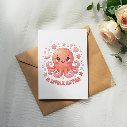 Illustration of a smiling pink octopus and shells on a card reading "A LITTLE EXTRA".